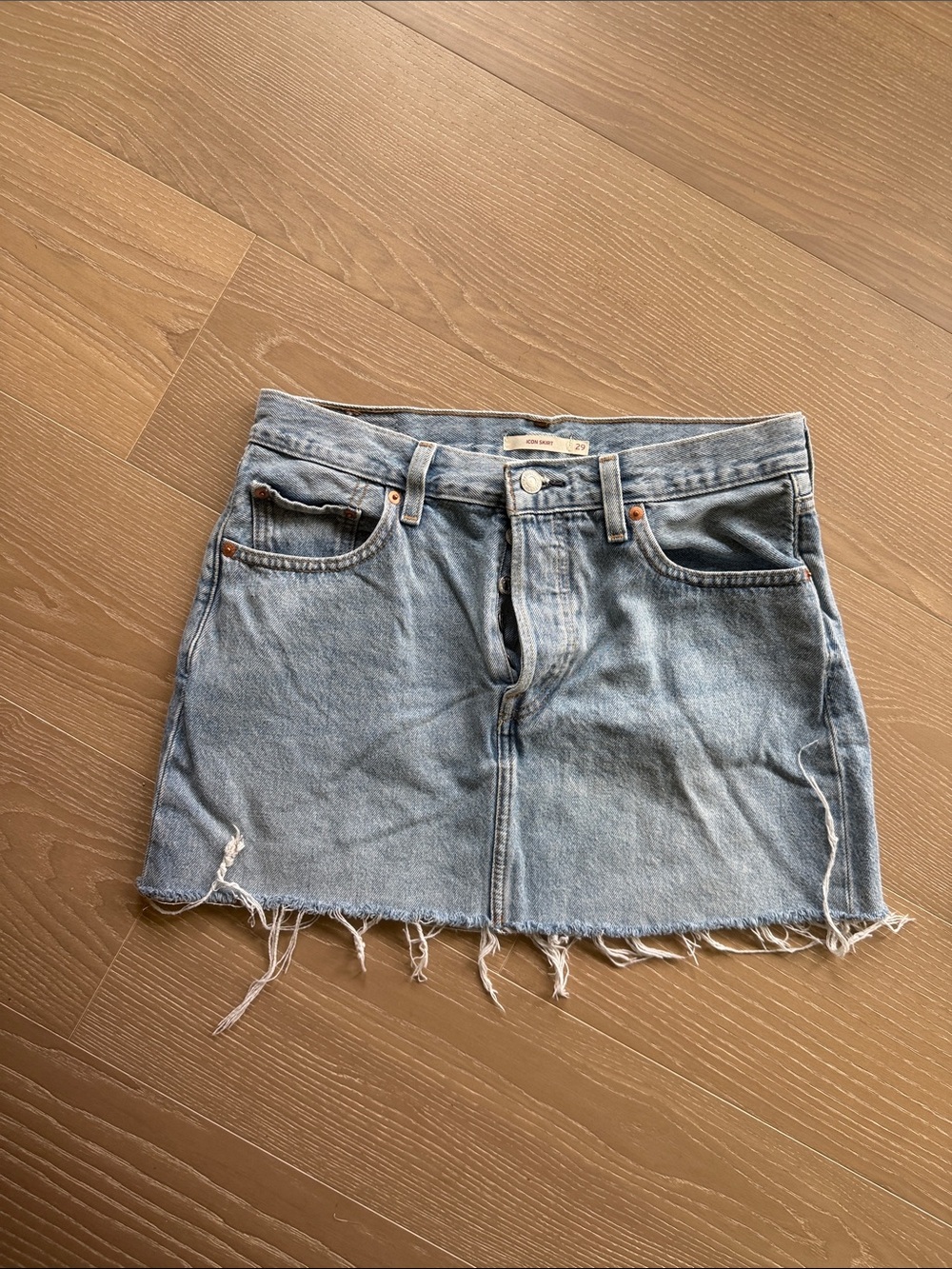 Levi’s Distressed Light Blue Denim Mini Skirt
